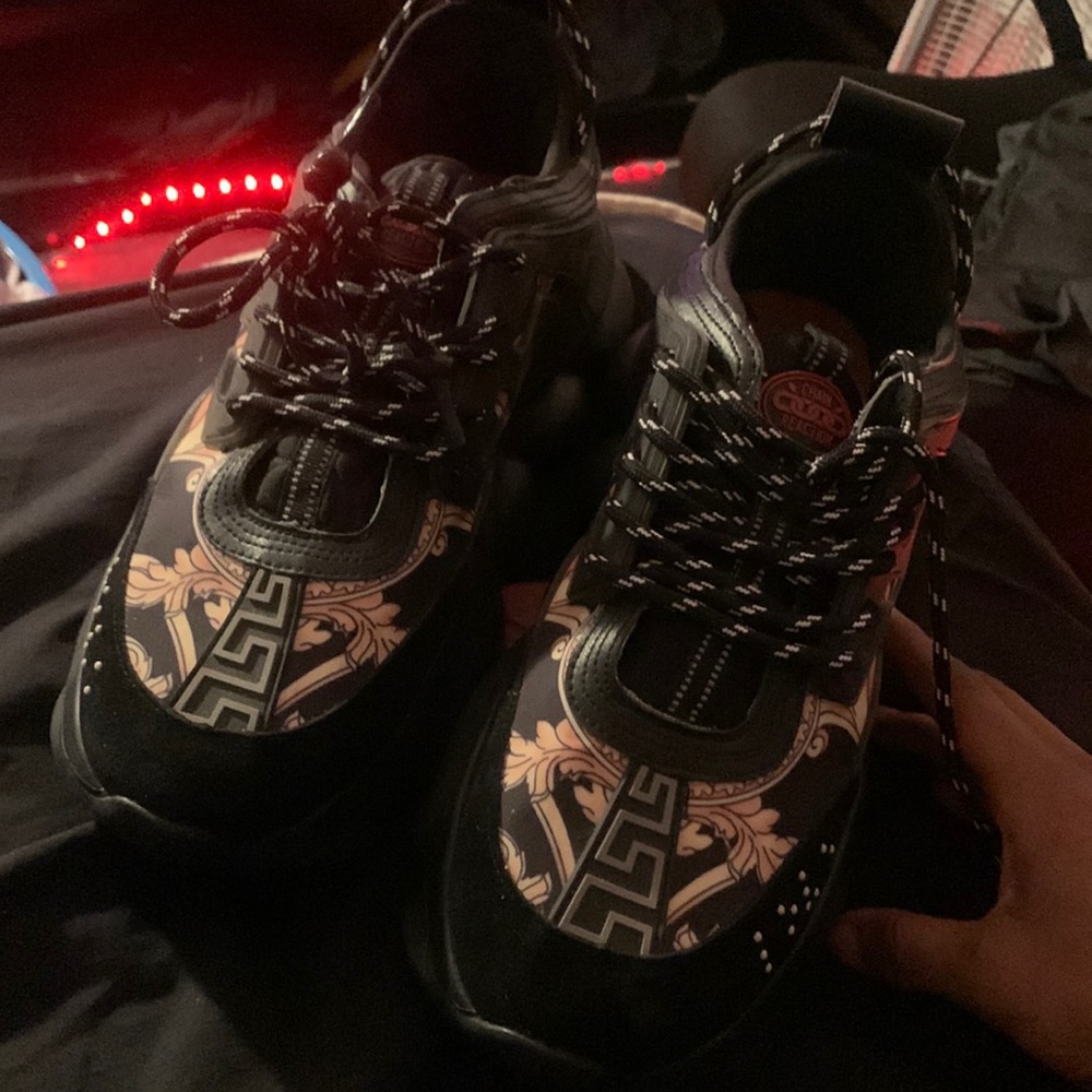 Versace chain reactions